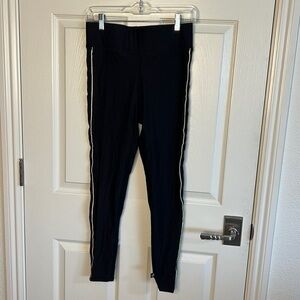 Terez leggings, never worn. Yellow piping down the side.